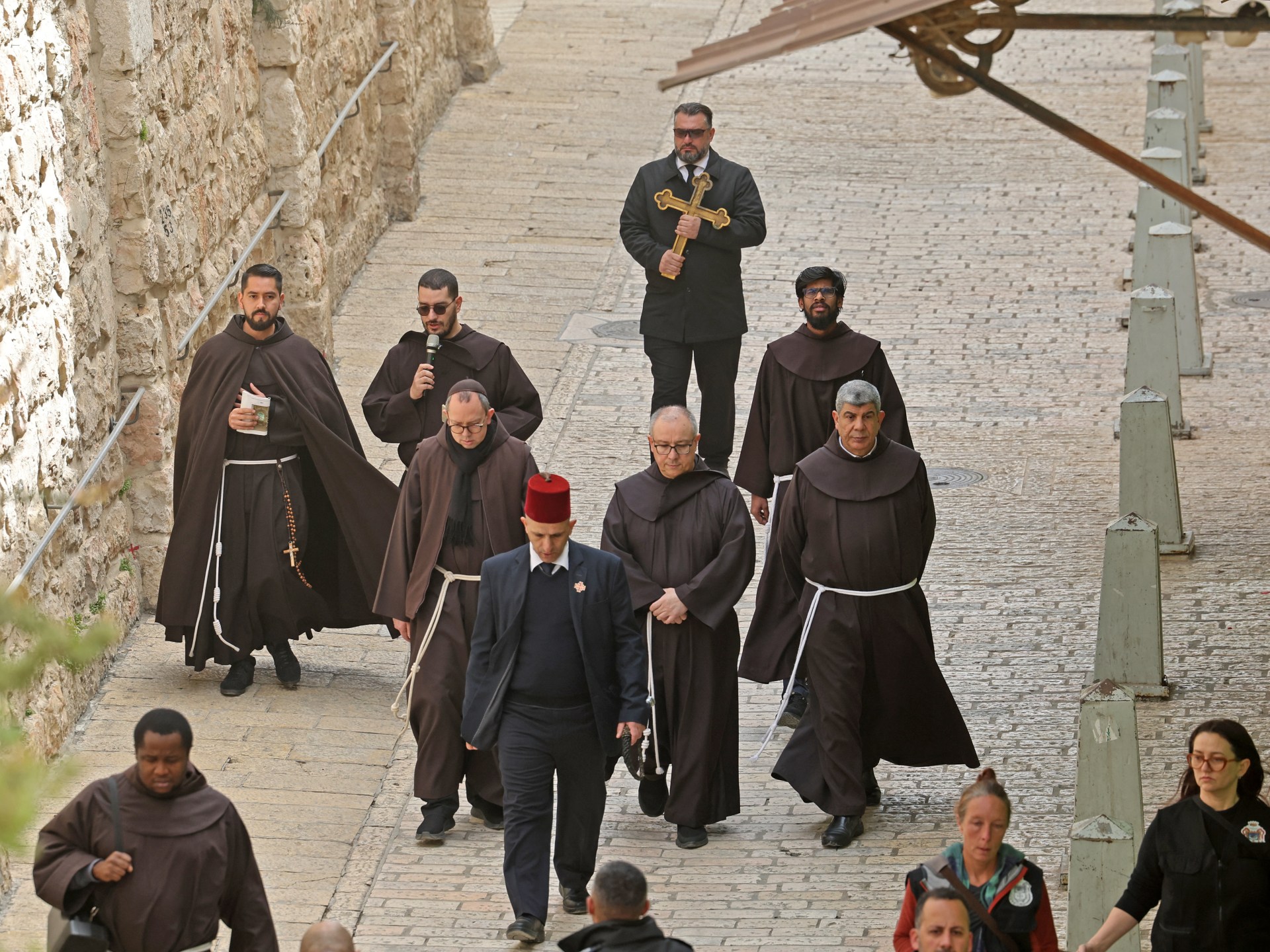 Monks hold Easter prayers in deserted Old City of Jerusalem